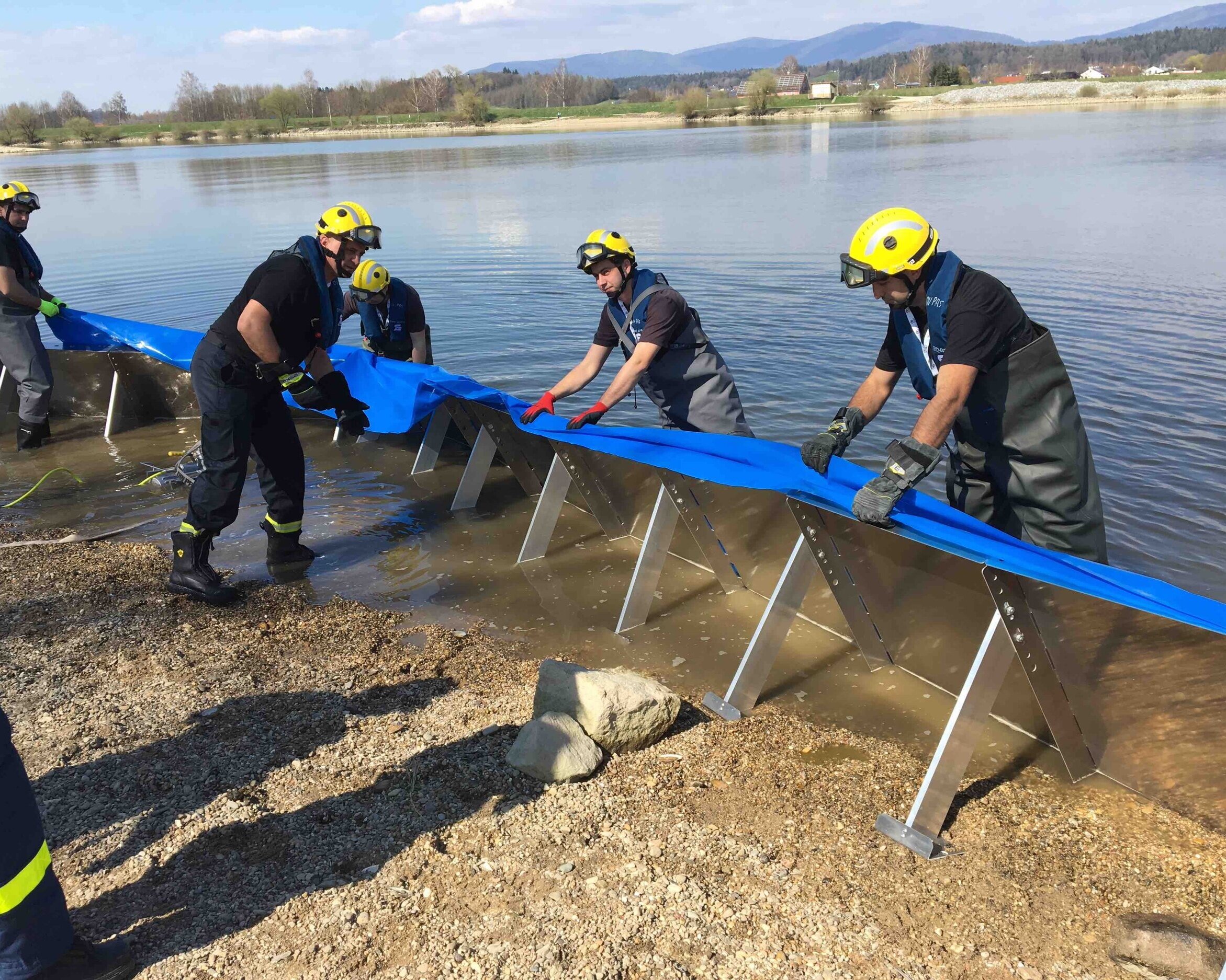 Inero barrier installation in water